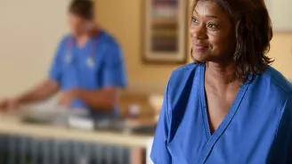 Nurse at Reception Desk