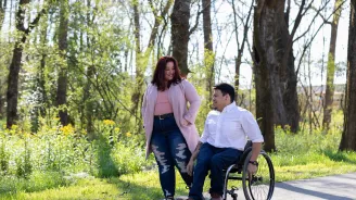 woman and man in woods