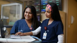 two female nurses working