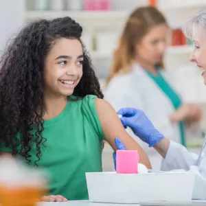 Young girl getting a flu shot