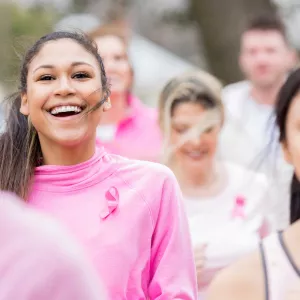 A group of people jogging outdoors