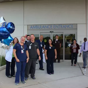 AdventHealth Wesley Chapel team celebrating its ambulance entrance