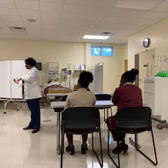 Nurses listening to a lecture 