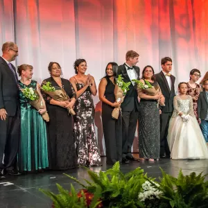 Families on stage at AdventHealth Golden Gala XXXVIII