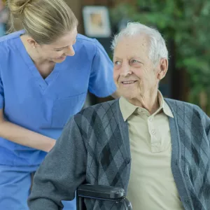 An older man in a wheelchair.