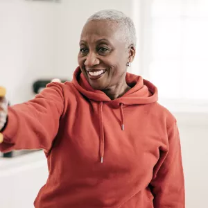 A woman exercising at home.