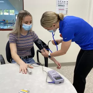 Marion County students gets blood pressure taken