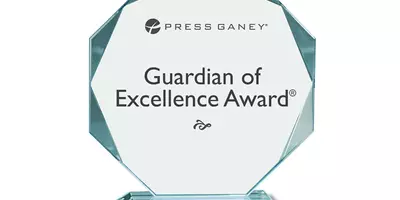 Press Ganey Guardian of Excellence Award trophy.