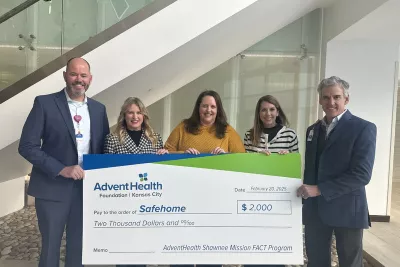 Safehome presented with $2,000 check