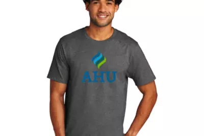 a man in an AHU shirt
