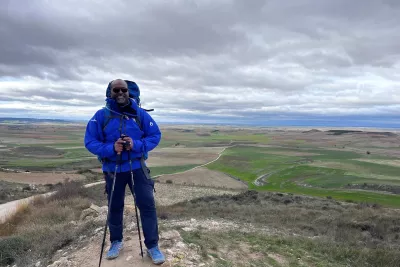 Abel Biri, AdventHealth Waterman president and CEO, walking the pilgrimage in 2023.