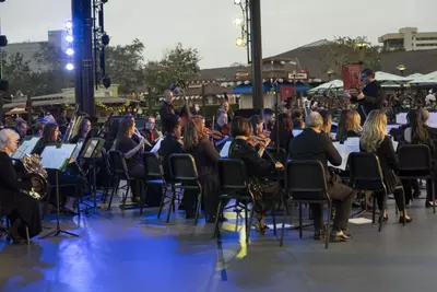 AdventHealth Orchestra Performing on the AdventHealth Waterside Stage at Disney Springs.
