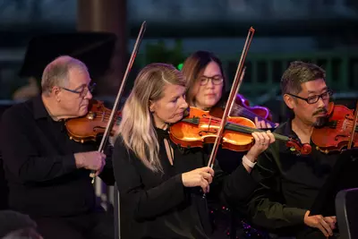 The AdventHealth employee orchestra performs at Disney Springs. 