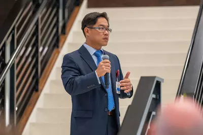 AdventHealth Orthopedic Sports Medicine Medical Director, Dr. Luke Oh, addresses the community in the Orlando Magic Family room located within the AdventHealth Training Center 