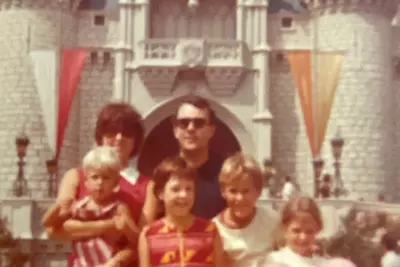 Doctor Metzger and his family at Disney's Magic Kingdom in 1976