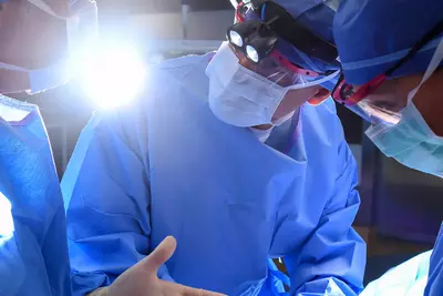 Surgeons discussing an operation