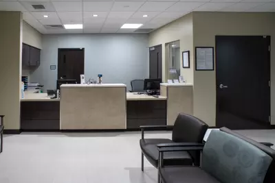 Lobby with desk and chairs