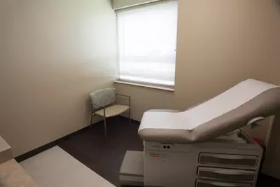 Room with chair and medical equipment