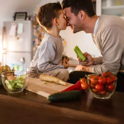 Dad and son in the kitchen.