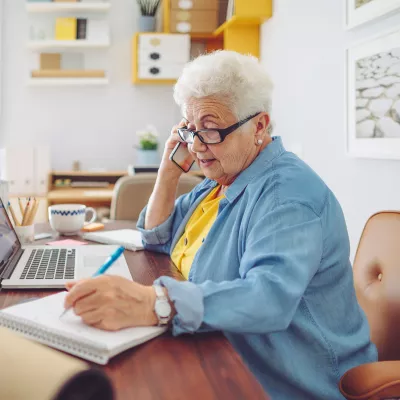 Elderly Woman working from home