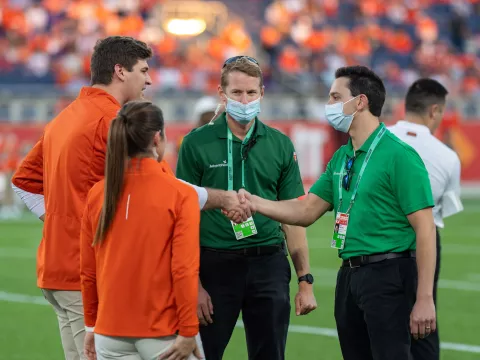 Team Members at a Citrus Bowl Game