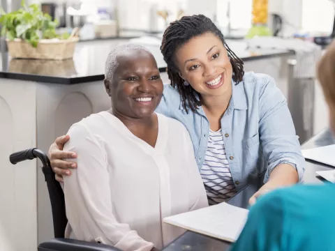Nurse with Mother and Daughter