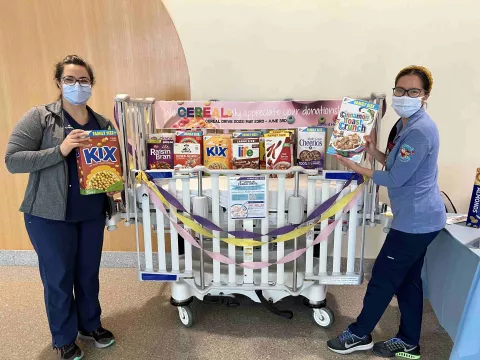 Cereal, food drives from AdventHealth team members assist in bridging the meal gap when students are out of school for the summer.