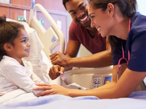 Little girl in hospital bed