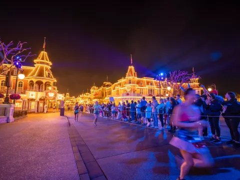 Runners running runDisney Princess Half Marathon at the Magic Kingdom.