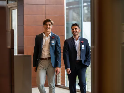 AdventHealth Leadership Interns walking at headquarters.