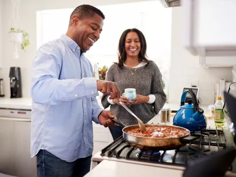 A couple cooking