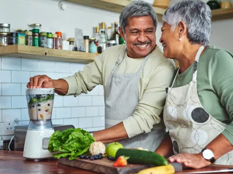 couple makes a delicious smoothie together