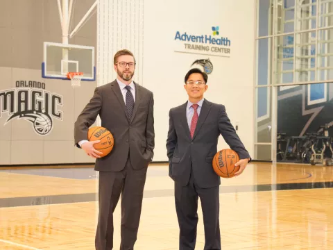 Dr. Oh and Dr. Youmans. Team Physicians of the Orlando Magic at the AdventHealth Training Center