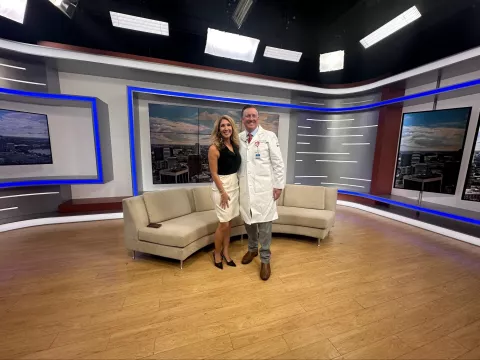 Dr. Daryl Osbahr in the FOX 35 studio with news anchor Amy Kaufeldt