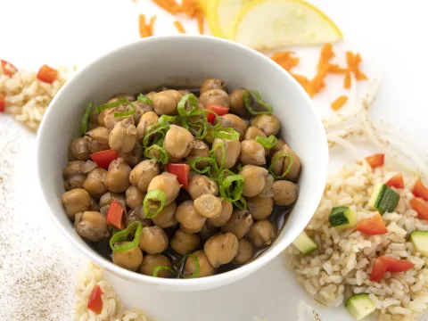 Bowl of garam masala brown rice bowl with garbanzos