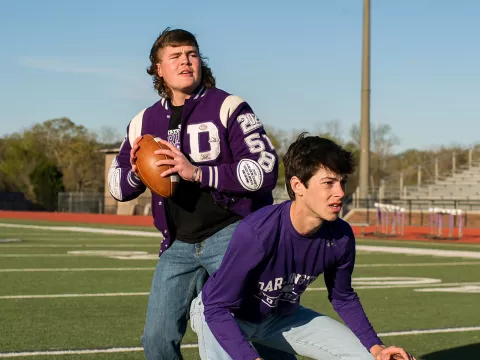 Gatlin playing football