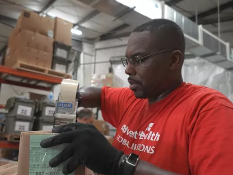 Volunteers working in Global Missions Warehouse