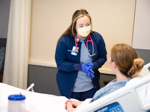 AdventHealth Murray nurse with patient