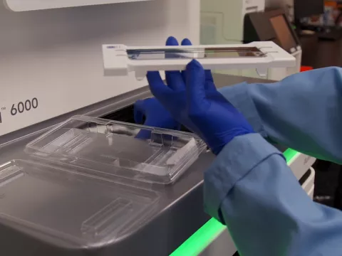 Technician uses matching-for-gene-sequencing