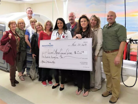 Palm Coast group, Ladies of Hidden Lakes, donates $500 to AdventHealth for the fight for cancer.