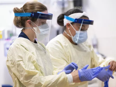 AdventHealth team members put on their protective gear.