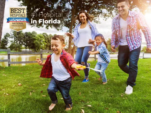 Happy family outdoors.