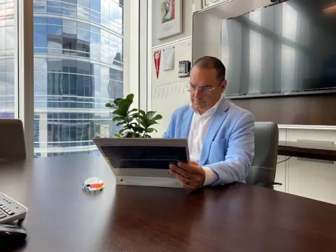 Dr. Victor Herrera in his office at AdventHealth Orlando.