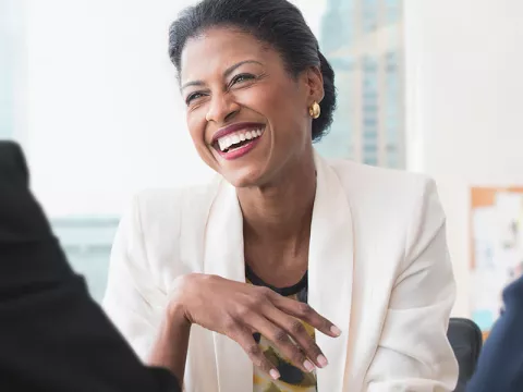 woman-in-a-meeting-laughing