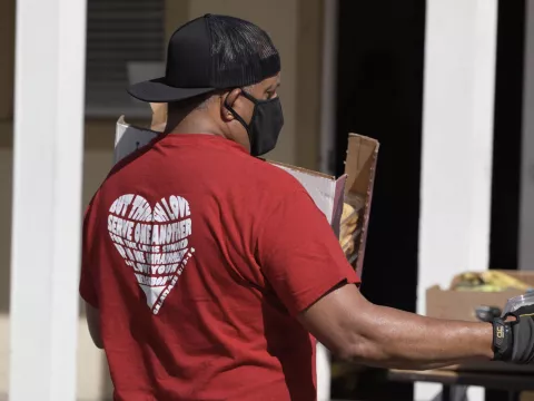 A man volunteering at Mars Hill Community Resource Spot food bank.