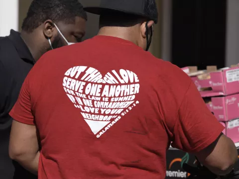 Man volunteering at Mars Hill Community Resource Spot food bank.