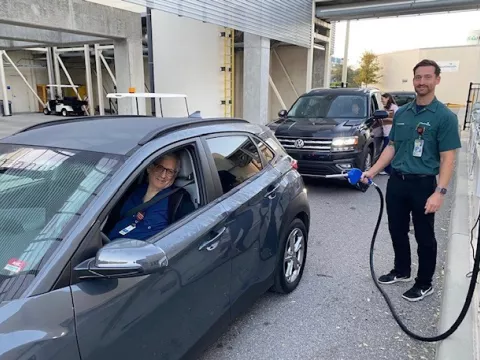 Team members receive fuel at AdventHealth Tampa following Hurricane Milton.