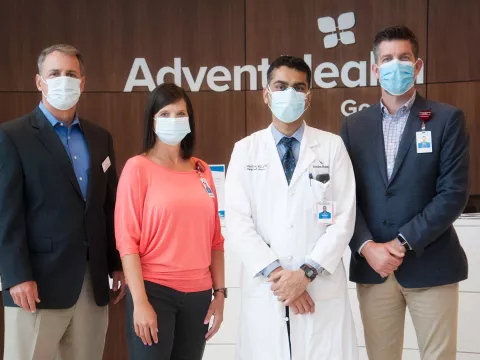 Kulkarni with AdventHealth staff