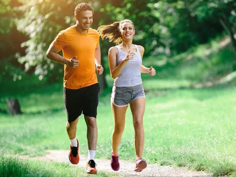 A man and a woman jogging