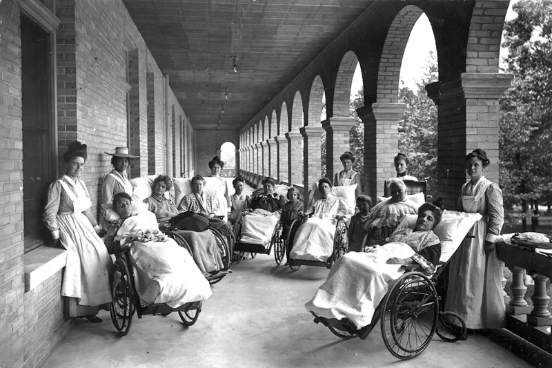Patients and nurses at The Western Health Reform Institute in 1867.